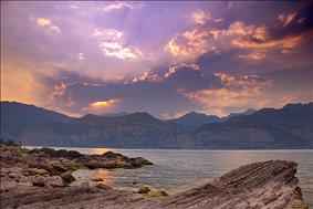 The Brescia province reflected in the lake